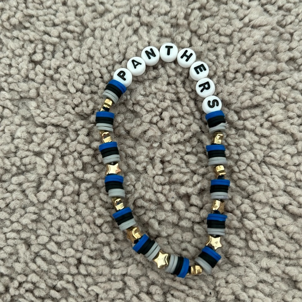 Men’s Carolina Panther’s NFL football team clay bead  bracelet with gold star
